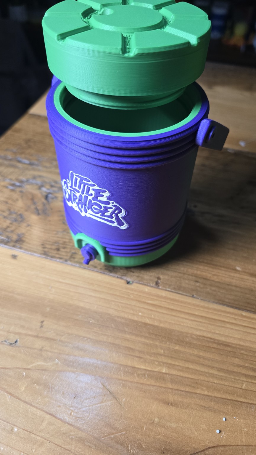 Open purple and green Little Stranger 3D printed container