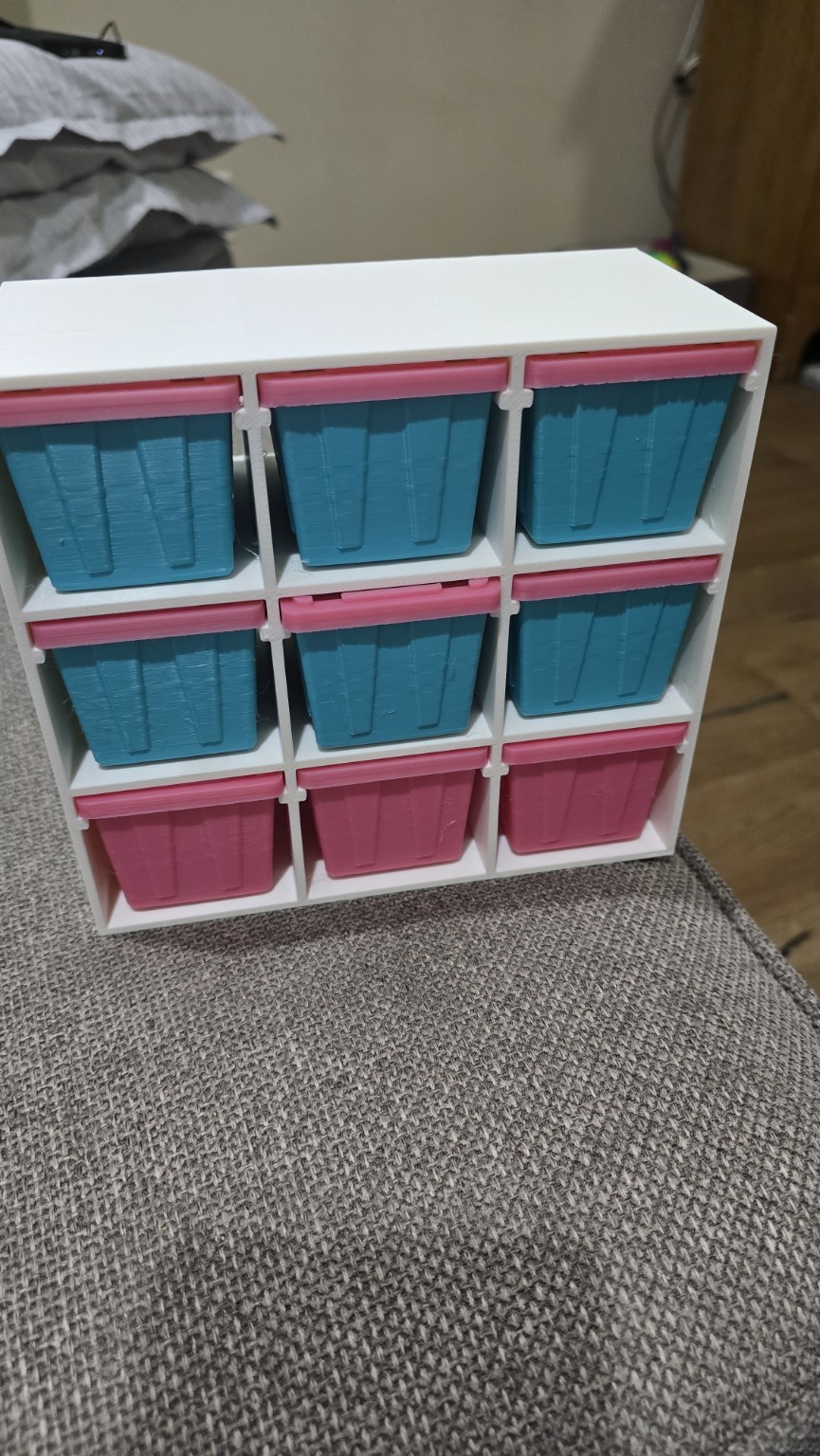 White pink and blue 3D printed modular drawer organizer