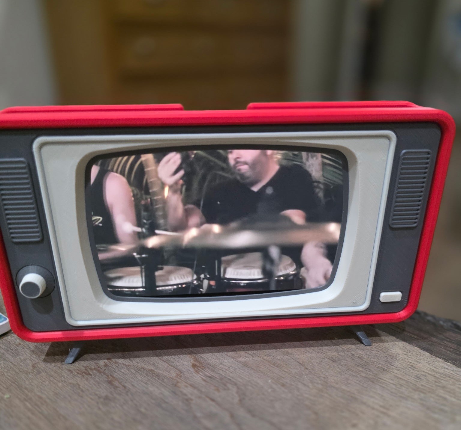 Red black and white retro television-shaped display frame