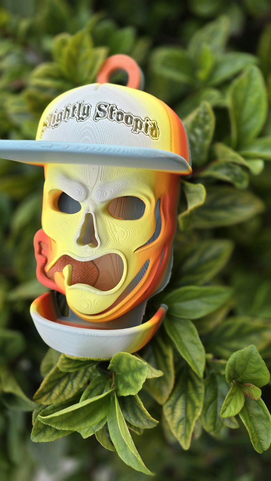 Colorful skull character 3D printed bird feeder