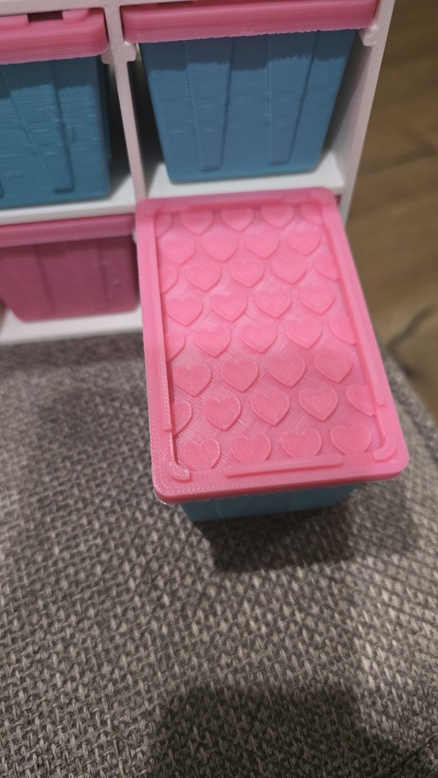 Open pink drawer from a custom 3D printed organizer